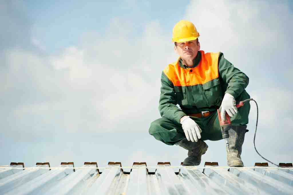 What qualifications should I look for in a roofer?